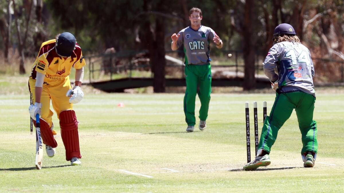 GOT HIM: Wagga City wicketkeeper Ben Turner whips off the bails to run Sam Smith out for a duck in Lake Albert's loss at Rawlings Park on Sunday. Picture: Les Smith