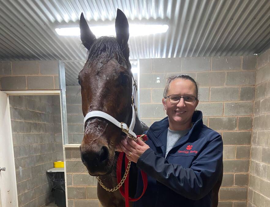 WINNERS ARE GRINNERS: Leeton trainer Jodie Ward scored her first win with Charlie Studleigh on her home track on Tuesday night. It broke a string of placings for the four-year-old to bring up his maiden success. Picture: Ellen Bartley