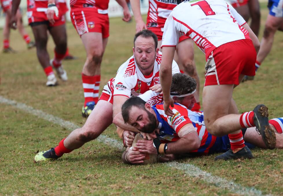 TRY TIME: Blake Hewitt crashes over for Young right on half-time to give them plenty of momentum in the narrow loss to Temora on Sunday. Picture: Emma Hillier