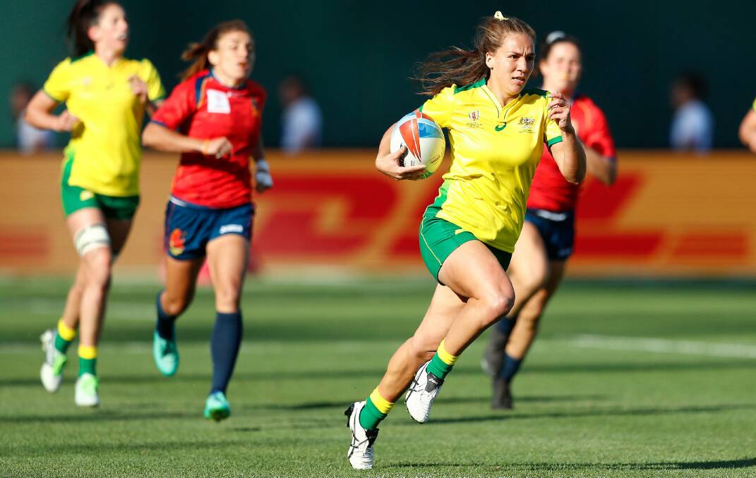 TRY TIME: Australia's Evania Pelite races away for a try against Spain on Saturday morning. Picture: Mike Lee - KLC fotos for World Rugby