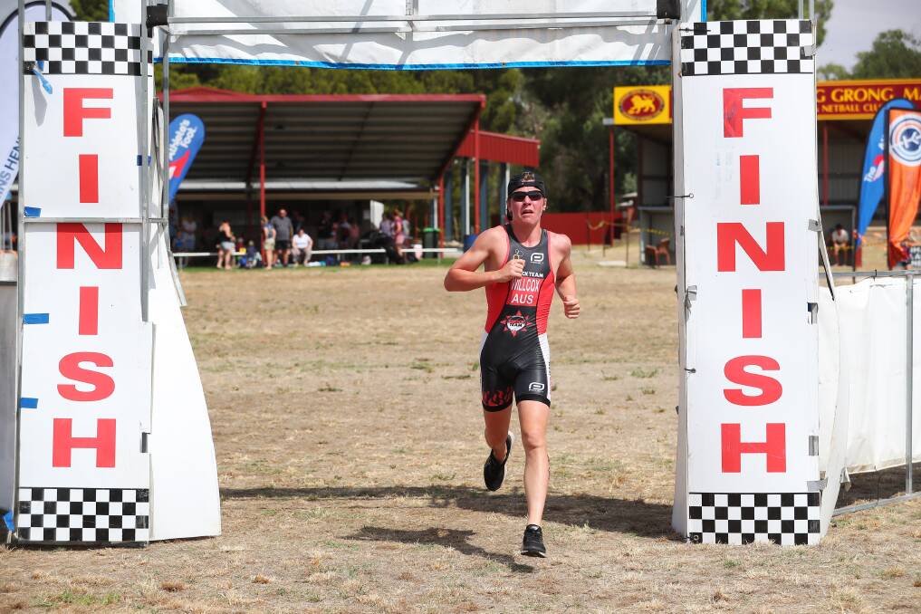 THEY HIT THE LINE: Liam Wilcox, 14, took out the Ganmain triathlon on Sunday following a strong run home in the opening event of the Riverina Tri Series. Picture: Emma Hillier