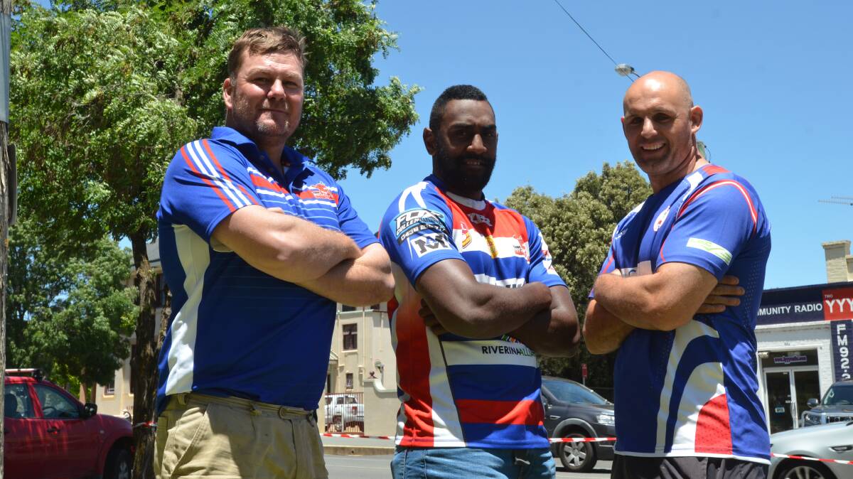 COMING ON BOARD: Young vice president Greg Smith and coach Roy Jewitt (right) welcome new centre Boro Navari to the club. The Fijian the first big signing for the Cherrypickers since Jewitt took over the coaching role. Picture: The Young Witness