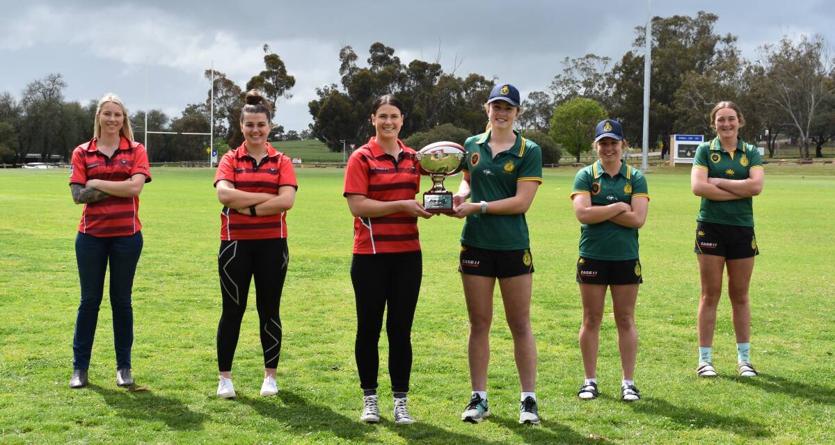 CSU's Georgia Roberts, Sophie Thomson, Ivy Merlehan and Ag College's Liz Young, Jess Ryan and Meg Seis want to get their hands on the cup.
