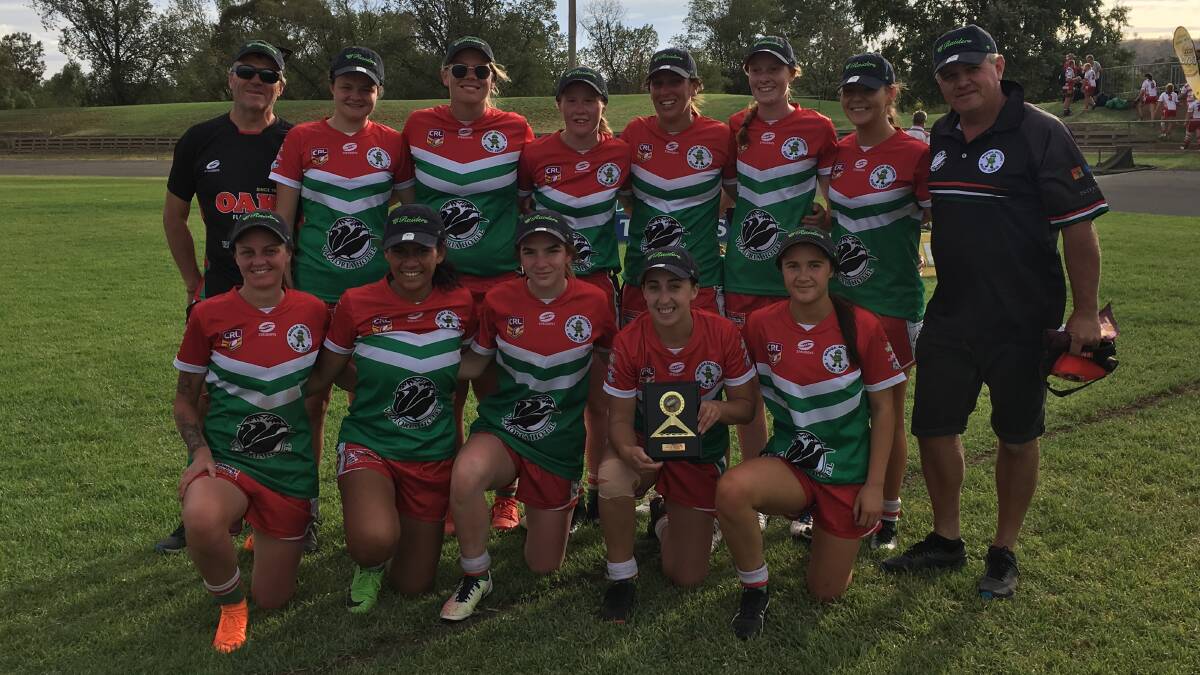 WINNERS ARE GRINNERS: Brothers celebrate after winning a tight leaguetag final at the nines at Cootamundra on Saturday. Picture: Courtney Rees