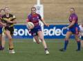 ON THE FLY: Lauren Jolliffe makes a break before going on to score one of her five tries as Kangaroos dominated Gundagai on Saturday. Picture: Madeline Begley