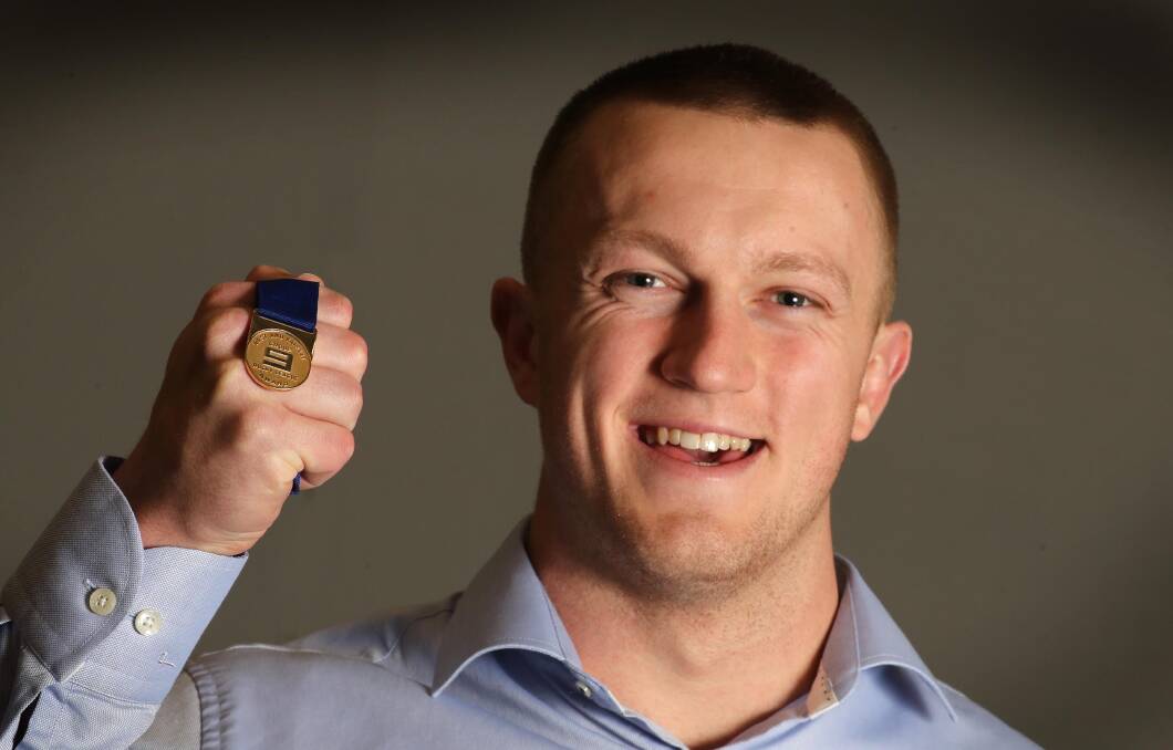 Tumut prop Zac Masters celebrates his Weissel Medal success.