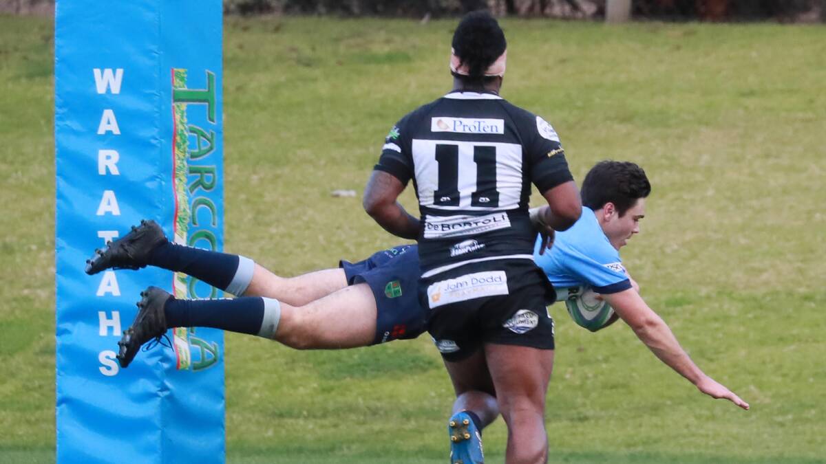 INDIVIDUAL BRILLIANCE: Will Wennerbom dives over to score as Waratahs took a one-point win over Griffith at Conolly Rugby Complex on Saturday. Picture: Les Smith