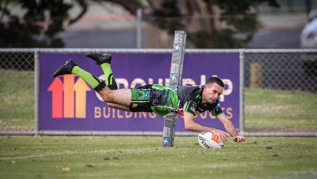 TRY TIME: Curtly Jenkinson dives over to give Albury a little joy on a tough day against Young at Greenfield Park on Sunday. Picture: James Wiltshire/The Border Mail