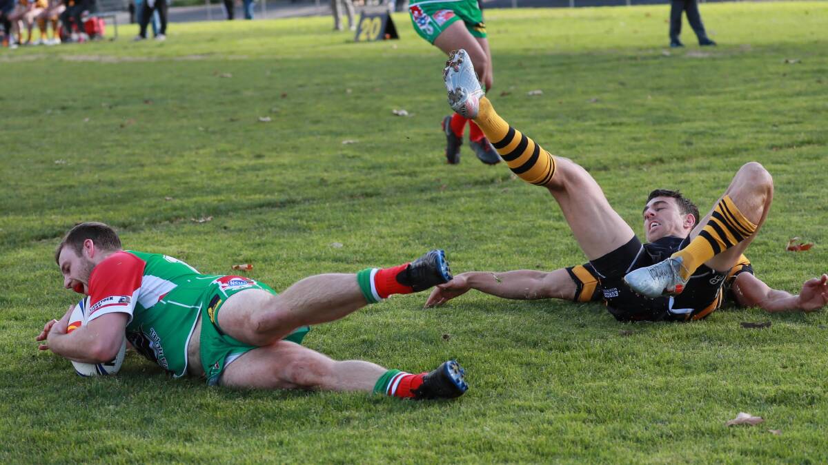 TRY TIME: Joe Leggatt beats James Smart to the ball to score first for Brothers in their 26-18 loss to Gundagai..
