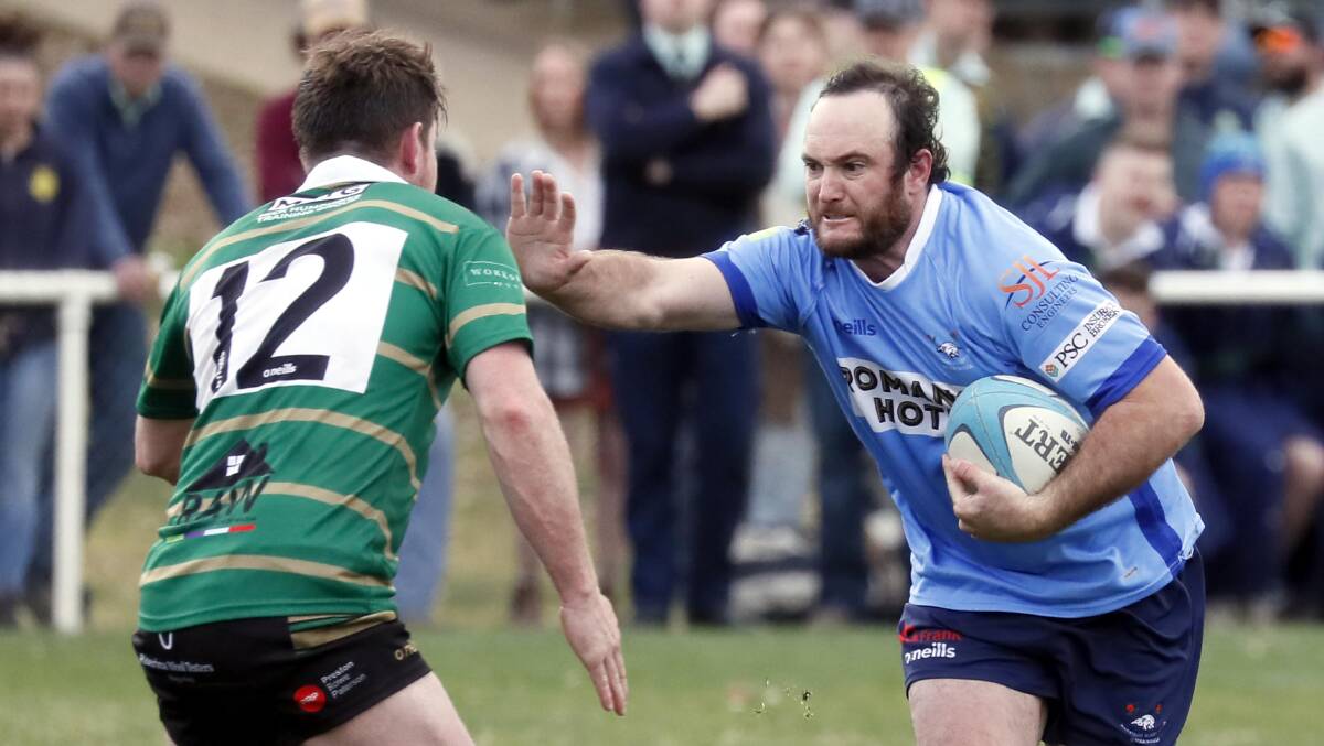 IN HOT WATER: Waratahs inside centre Jayden Stanton, pictured fending off Ethan Brien, was red carded in the win over Ag College on Saturday. Picture: Les Smith