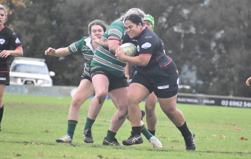 CHARGING THROUGH: Seigia Seukeni tries to break out of the Ag College defence in Griffith's narrow loss on Saturday. Picture: Liam Warren