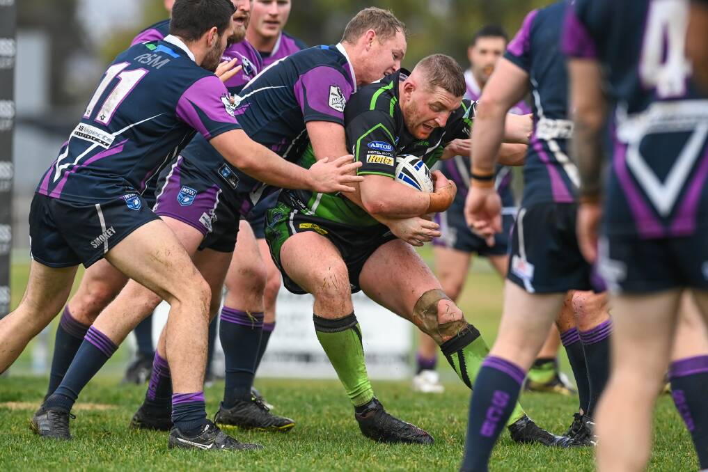 GOING NOWHERE: Brad Hill is wrapped up by the Southcity defence in Albury's 40-12 loss at Greenfield Park on Sunday. Picture: Mark Jesser