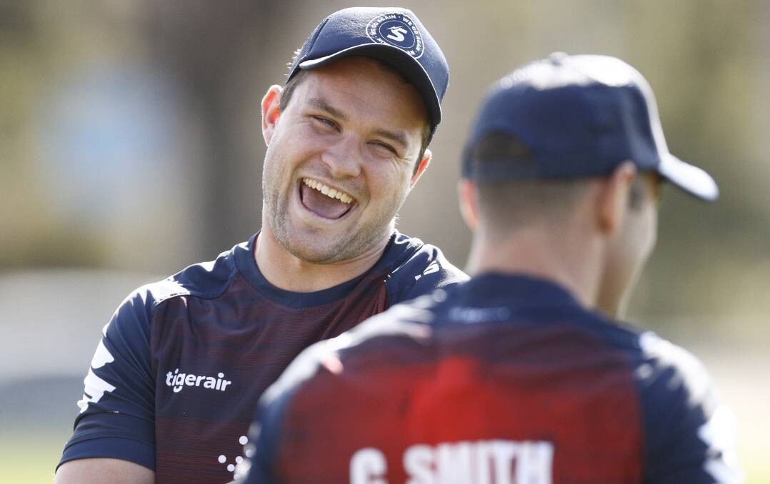 GRAND FINAL BOUND: Joe Stimson shares a laugh with Cameron Smith at a Melbourne Storm training run earlier this month. He will play in the NRL grand final on Sunday.