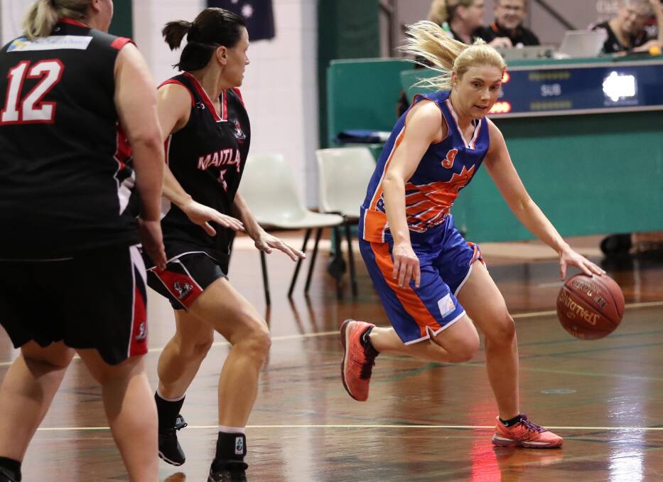 ON THE MOVE: Wagga Blaze leader Steph Male works to bring the ball down the court in her team's first win of the season on Saturday. Picture: Les Smith