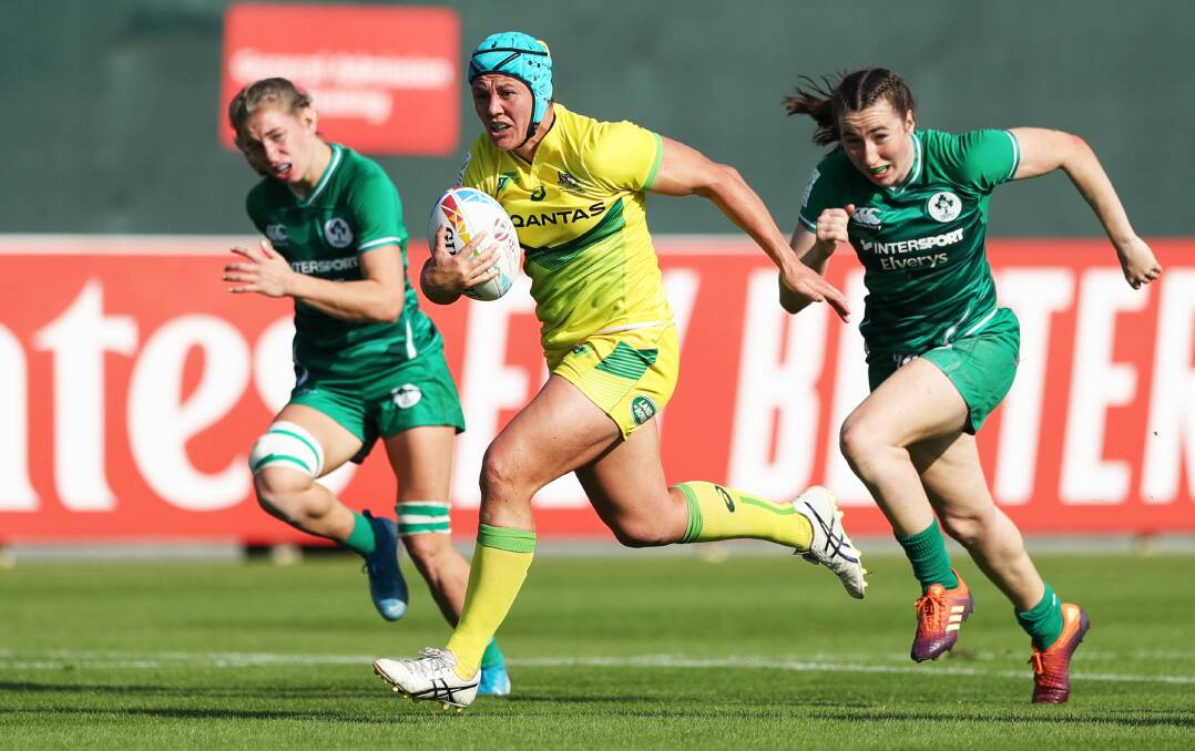 BREAKING FREE: Batlow's Sharni Williams on her way to scoring a try in Australia's win over Ireland in the pool stages of the Dubai World Series. The women's team finished in fourth after losses to Canada and the USA. Picture: Mike Lee - KLC fotos for World Rugby