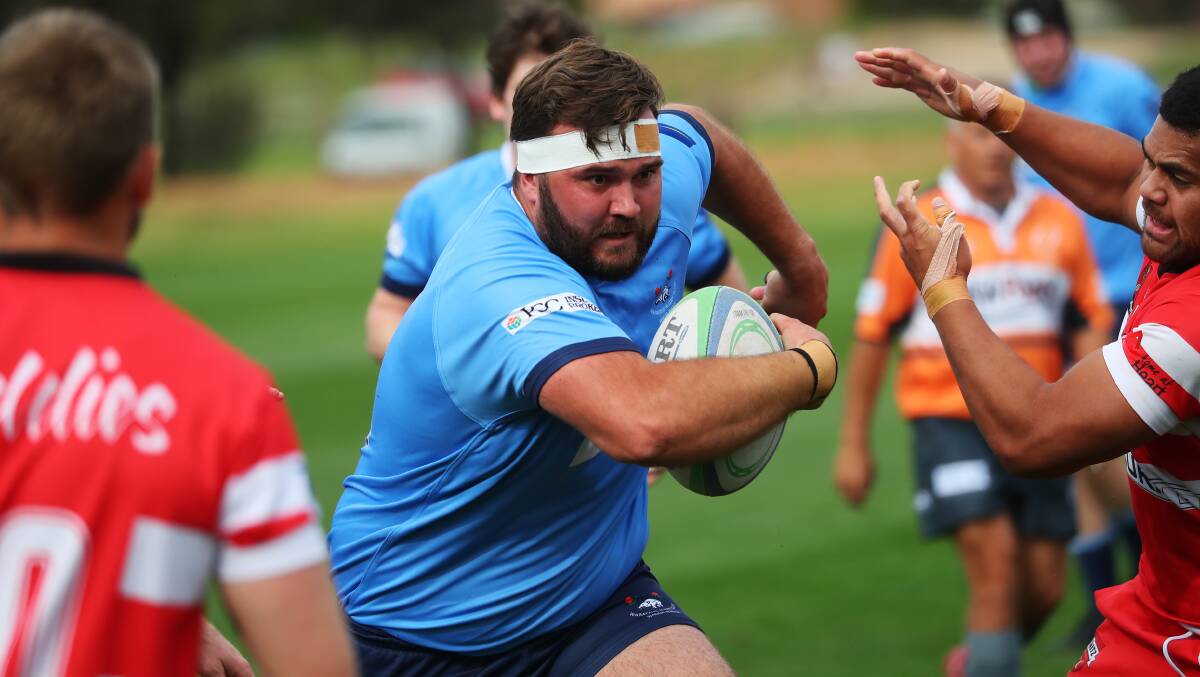 FULL STEAM AHEAD: Rob Wiltshire charges forward as Waratahs scored a 44-21 win over CSU at Conolly Rugby Complex on Saturday. Picture: Emma Hillier
