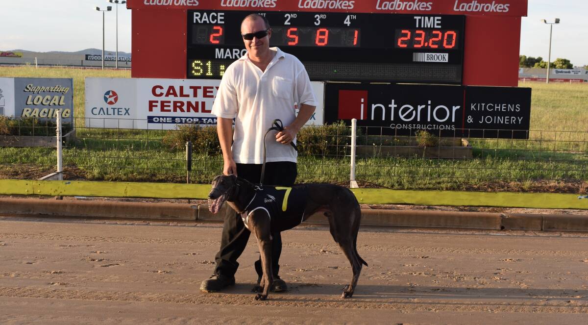 BREAKTHROUGH: Handler Tim McCaffery with Light 'Em Sparky after he won his first race at start 20 for Cowra trainer Rod McDonald at Wagga on Friday. Picture: Courtney Rees