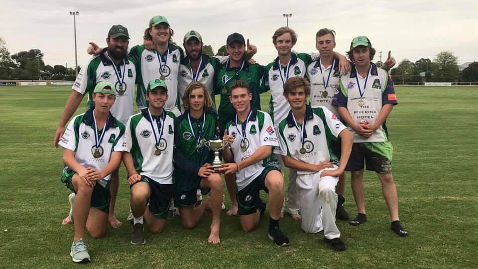 Wagga City celebrates after their dramatic third grade success on Sunday.