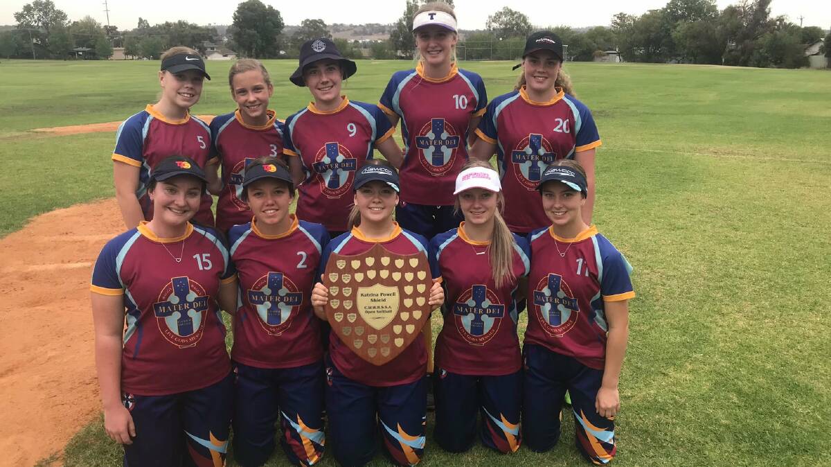 SWEET SUCCESS: Mater Dei Catholic College celebrate after winning the Katrina Powell Shield with a 5-1 victory over Kooringal High School on Tuesday.