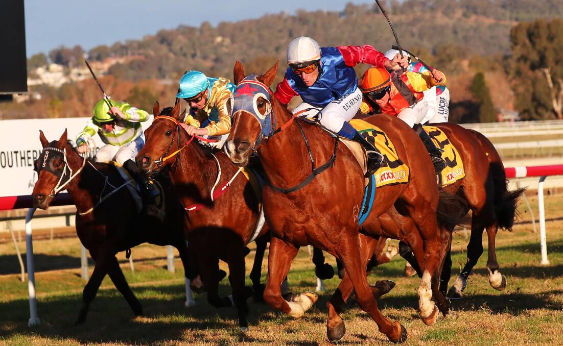 BIG DAY OUT: Tearful Kitty and Brett Fliedner give Wagga trainer Trevor Sutherland four winners at Murrumbidgee Turf Club on Monday. Picture: Emma Hillier