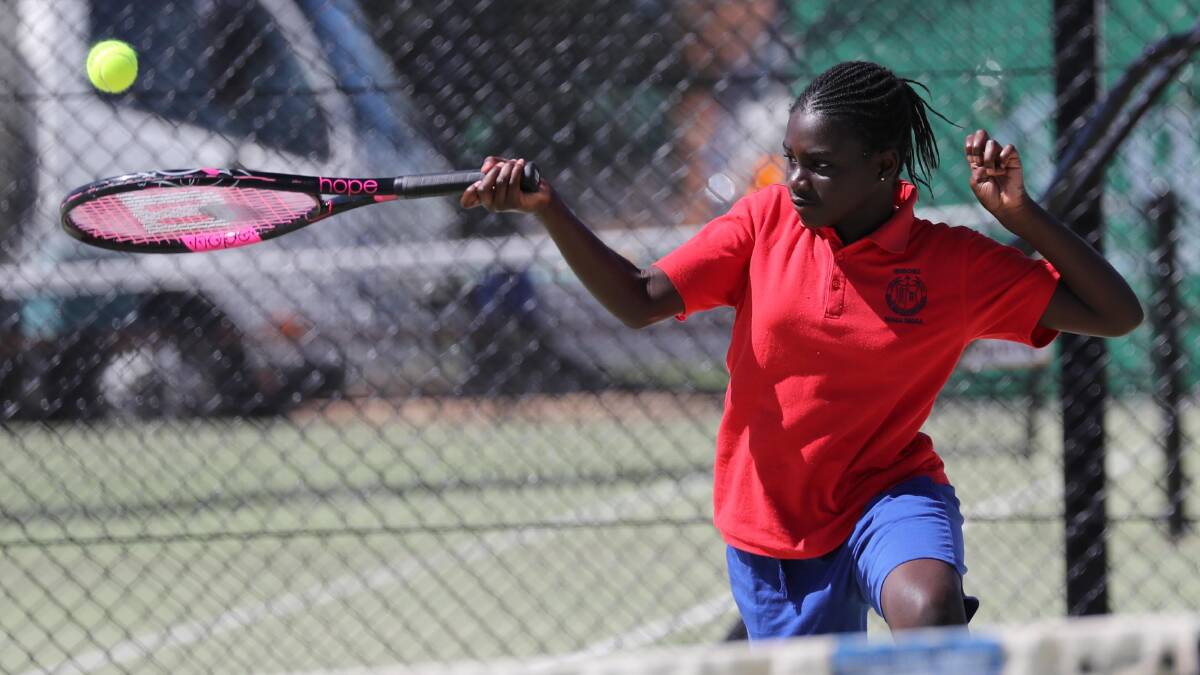 STRONG GAME: Alina Osei, 10, from Henschke, puts plenty of power into her shot during the Kaitlin Staines Cup at Jim Elphick Tennis Centre. Picture: Les Smith