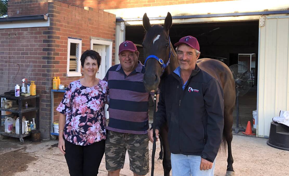 RIDING THE ROCKET: Owners Maria and Noel Penfold and trainer Scott Spackman with Rocket Tiger before finishing third in the Black Opal. Picture: Peter Doherty