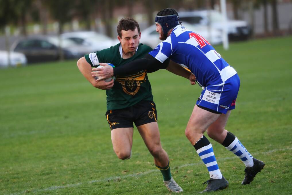 PUSHING FORWARD: Lochie Ramm tries to fend off Jayden Stanton as Ag College suffered their third loss of the year against Wagga City on Saturday. Picture: Emma Hillier