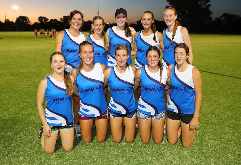 AKW Jets, pictured celebrating their 2018 premiership success, are looking to score another Wagga Touch grand final win on Tuesday.