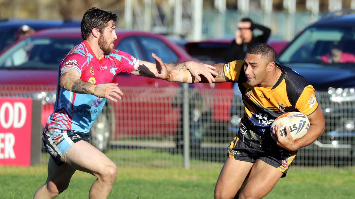 Lachlan Bristow goes to tackle Noa Fotu in the game he lacerated his kidney playing for Tumut in June.