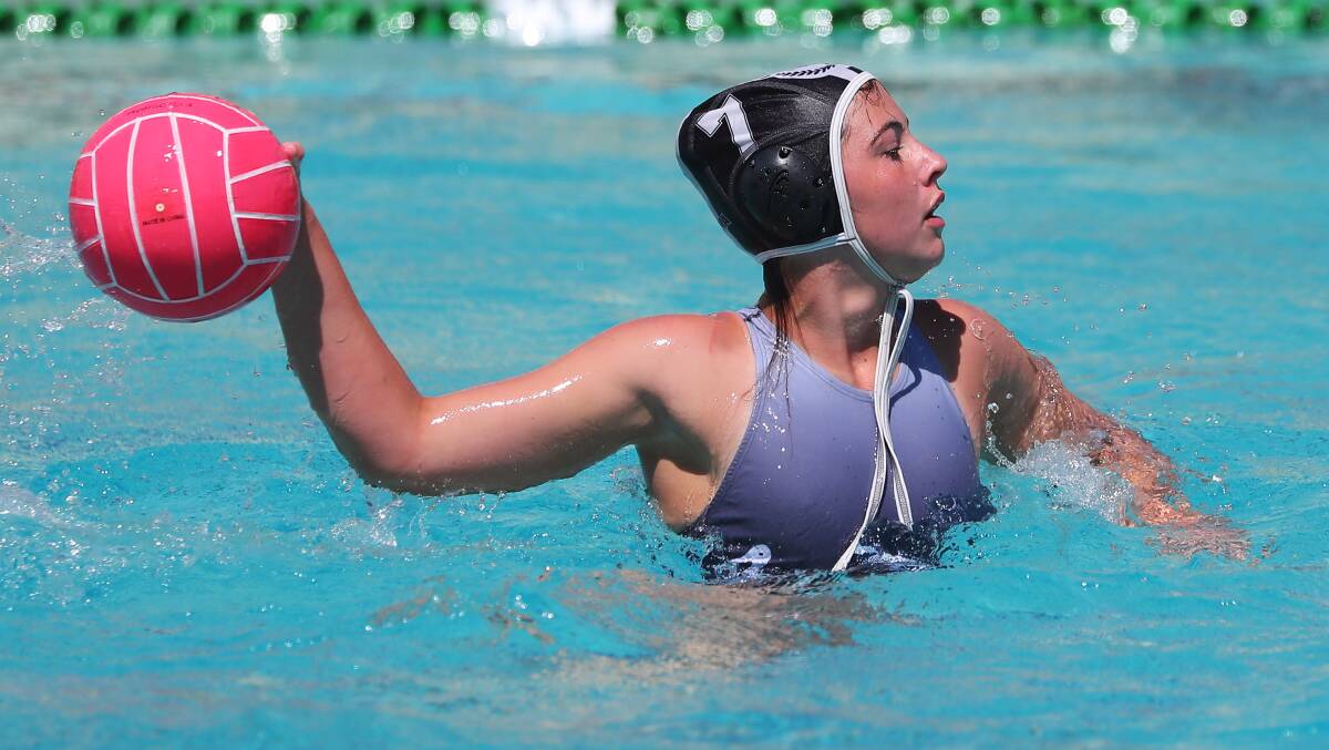 POWER PLAY: Tilly Smith looks to link up with a Riverina teammate during the NSW CHSSA girls water polo championships. Picture: Emma Hillier