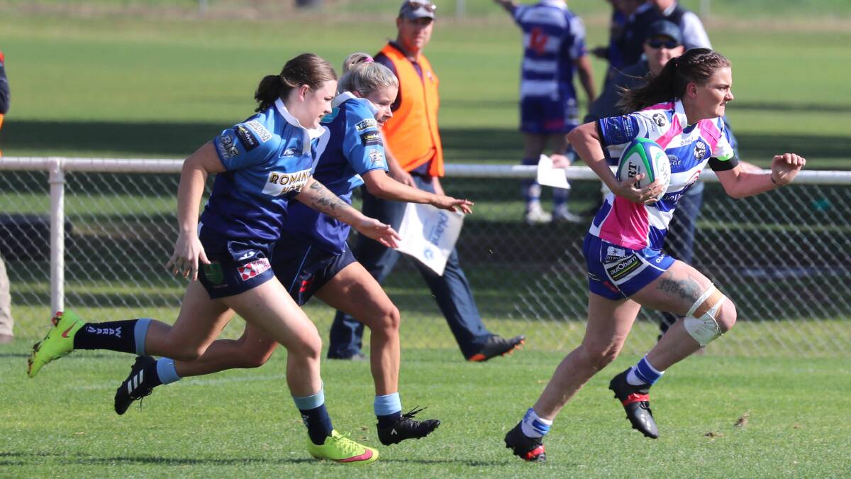 DASHING AWAY: Jess Burgess makes a break for Wagga City with Andrea Kirkby and Georgia Simpson hot in pursuit as Waratahs came through a close clash at Conolly Rugby Complex on Saturday.