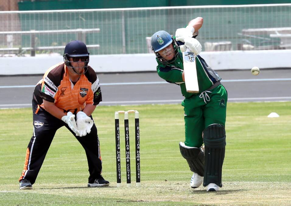 STAR POWER: Jon Nicoll sends the ball back down the ground after making an unbeaten 77 in Wagga City's win over Wagga RSL on Saturday. Picture: Les Smith
