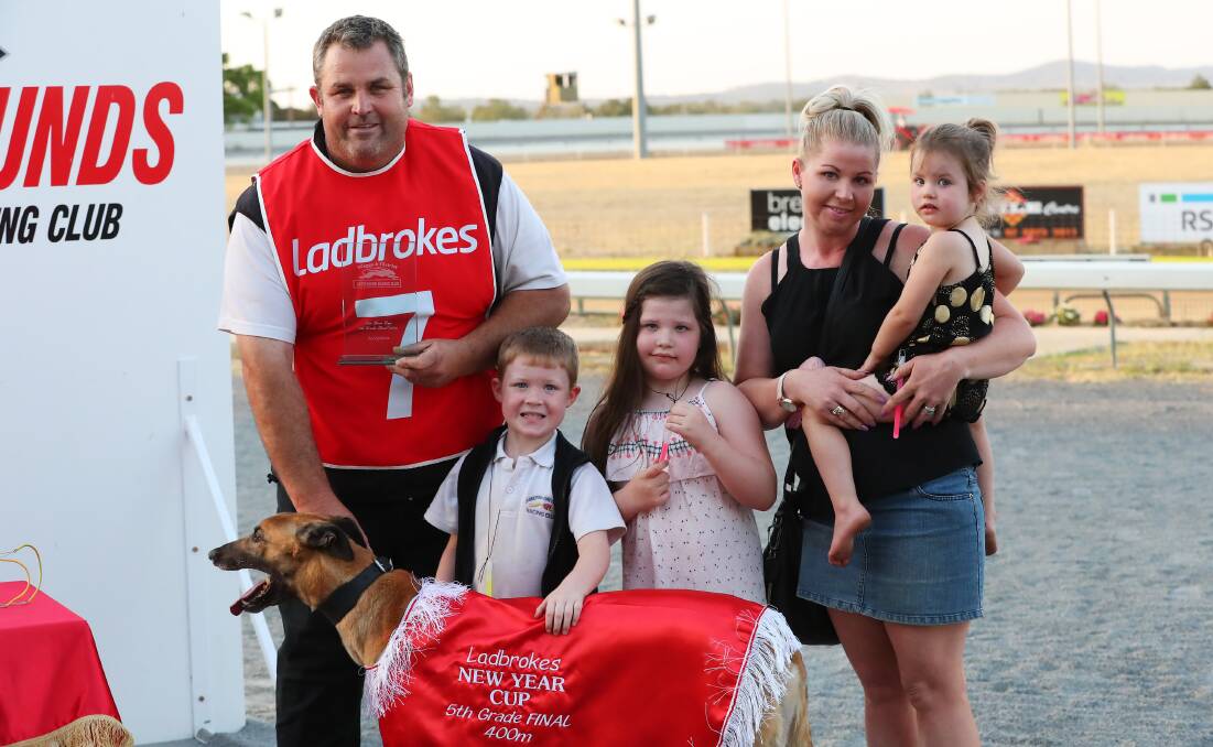 SWEET SUCCESS: Ben, Jax, 4, Tiara, 6, Tiffany and Maddison Talbot, 2, celebrate We Gotta Million's win in the New Year's Cup on Tuesday. Picture: Emma Hillier