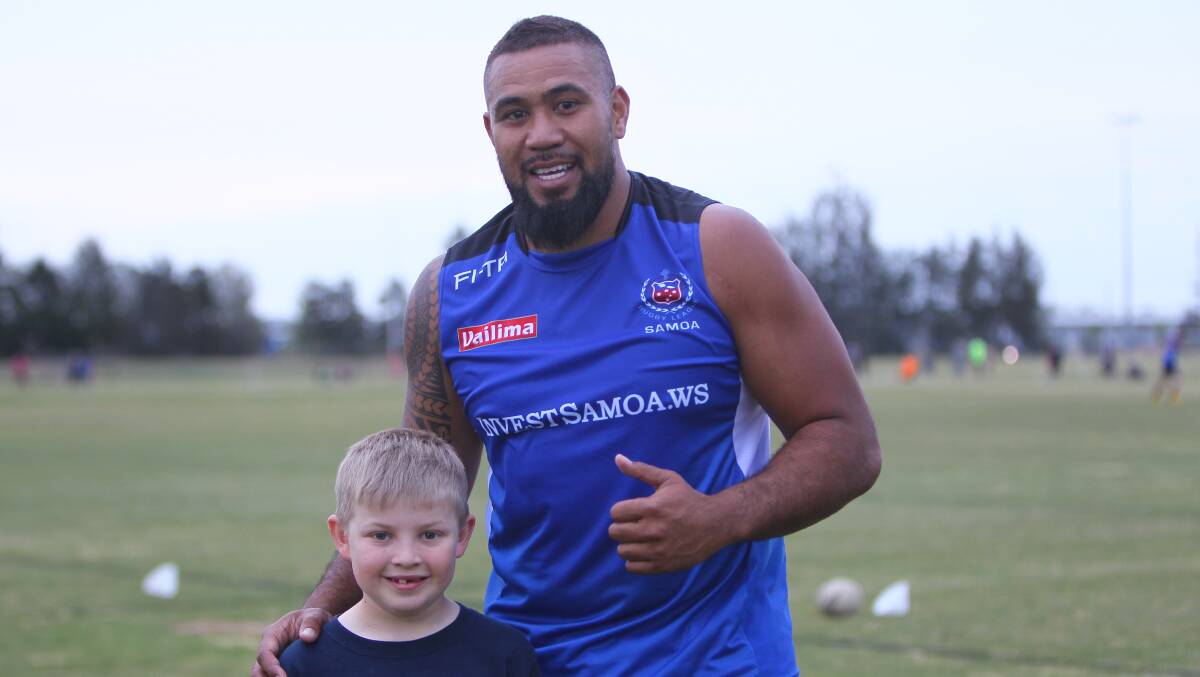 NEW IDOL: Samoa captain Frank Pritchard with young fan Nathan Hardy, 8, at Parramore Park on Wednesday. Picture: Courtney Rees