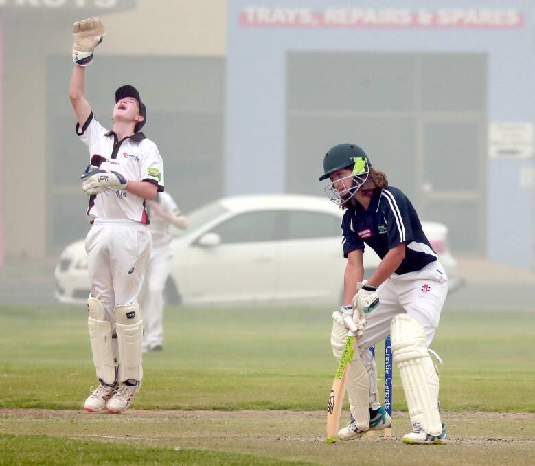 GOT HIM: Matt Barton celebrates after catching Lachie Mackley in Wagga's under 16s match on Wednesday. Picture: Les Smith