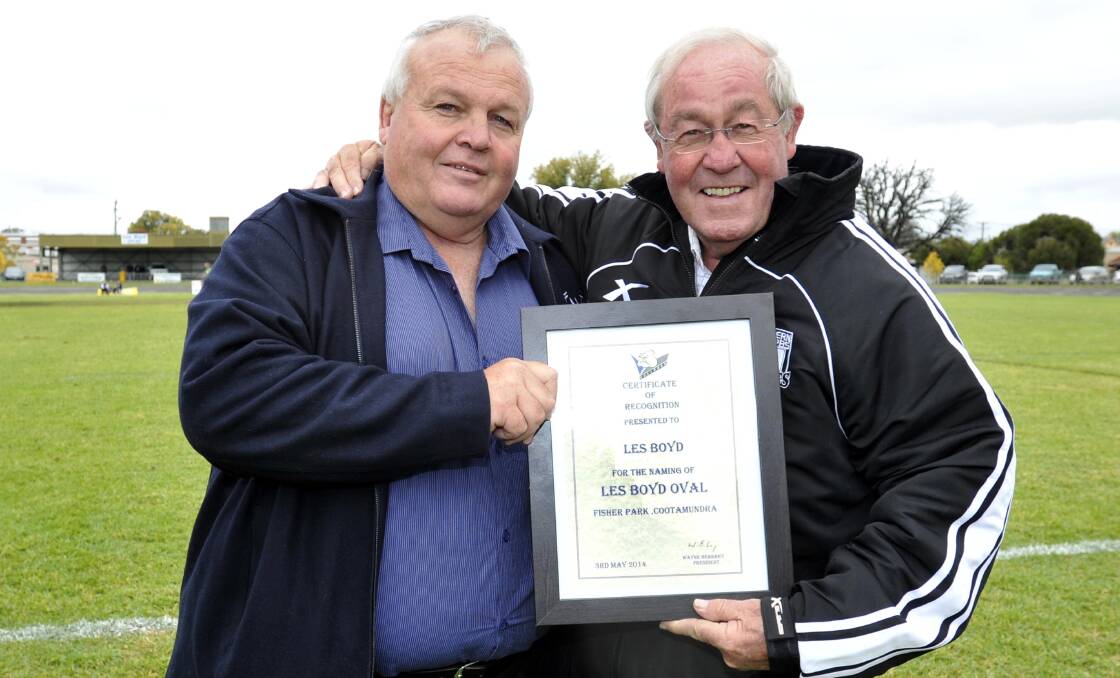 Cootamundra rugby league legend Les Boyd, pictured with Roy Masters at the renaming of Les Boyd Oval in 2014, is saddened by the Bulldogs plans not to play in Group Nine next season.