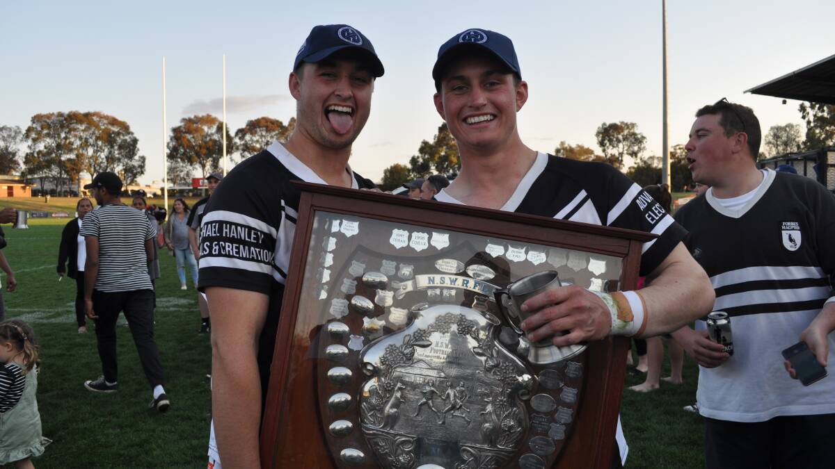 NEW CHALLENGE: New Temora recruit Jaiden Burke, right, celebrates his 2018 Group 11 premiership success with brother Mitch in 2018. He'll add another option at hooker for the Dragons. Picture: Nick McGrath