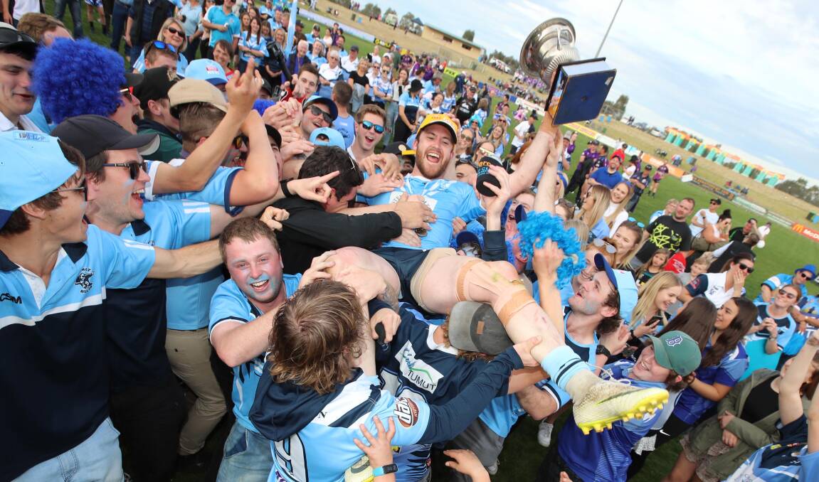RIDING THE WAVE: Tumut co-coach Lachlan Bristow, pictured celebrating after the Blues won the Group Nine title in September, is thrilled for the shot to defend their crown. Picture: Les Smith