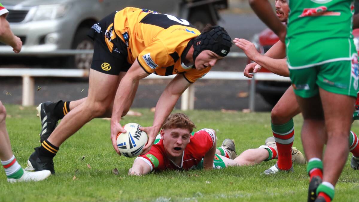 TRY TIME: Jack Elphick goes over for Gundagai as the premiers responded to a shock loss with a big win over Brothers on Sunday. Picture: Les Smith