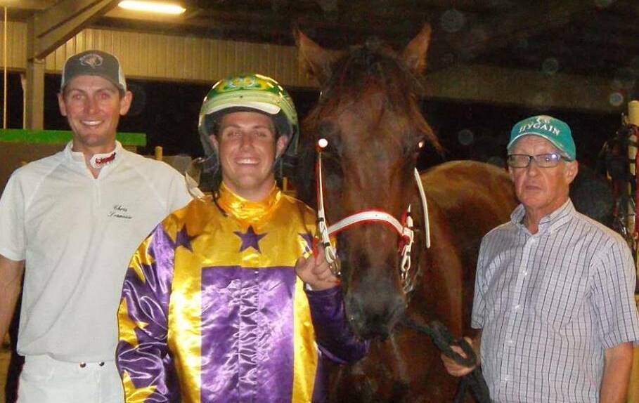Blake Micallef (centre) celebrates with Chris and Peter Svanosio after Major McRae's win in the Nic Dewar Memorial Series at Shepparton earlier this month.
