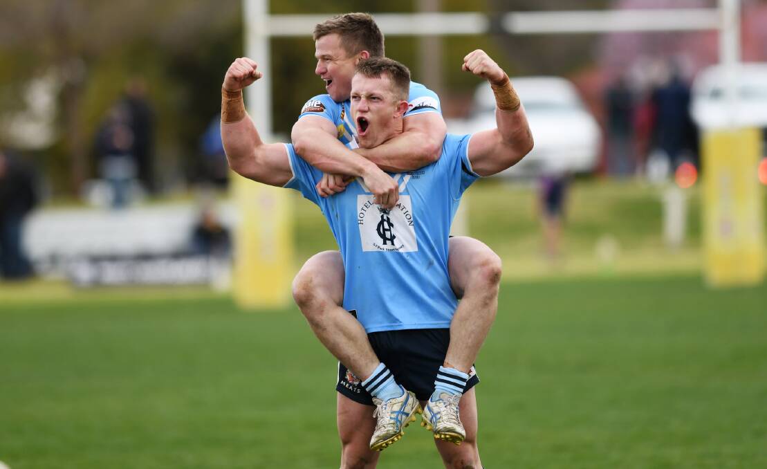 Zac Masters and Ben Roddy celebrate after Tumut's dramatic come-from-behind win over Gundagai in the preliminary final.