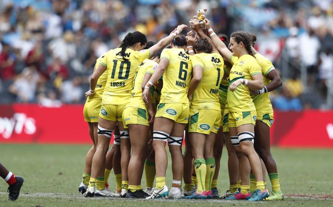 Australia in a team huddle before their heavy semi-final loss on Sunday. Picture: Mike Lee - KLC fotos for World Rugby