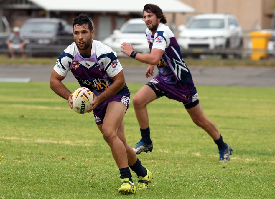 READY TO FIRE: Southcity playmaker Nathan Rose looks to spark something for the Bulls in the pre-season nines tournament with fullback Jake Dooley ever ready in support. 