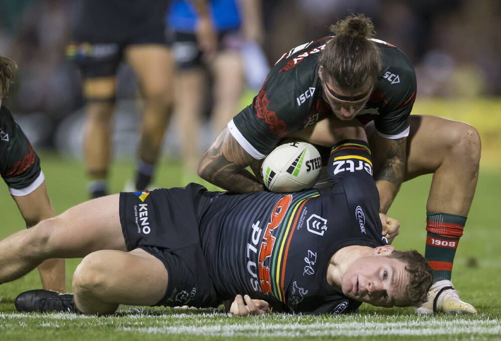WRAPPED UP: Temora product Liam Martin, pictured being tackled in Penrith's loss to South Sydney on Friday, will line up at Equex Centre on Saturday in the clash with Canberra.