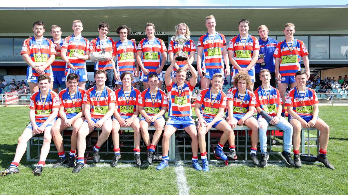 BACK-TO-BACK: Young celebrates after sneaking past Gundagai 12-10 on Sunday to claim back-to-back Sullivan Cup premierships. Picture: Les Smith