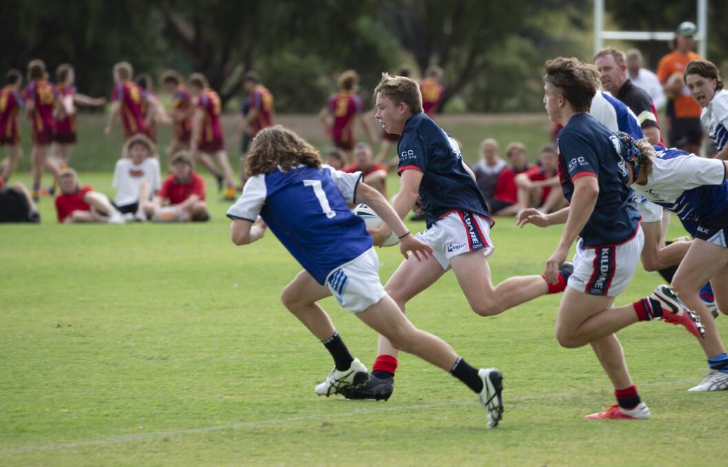 ON THE BURST: Cohen Benson makes a break during Kildare Catholic College's big win over Wagga High School to start their Hardy Shield campaign on Monday. Picture: Madeline Begley