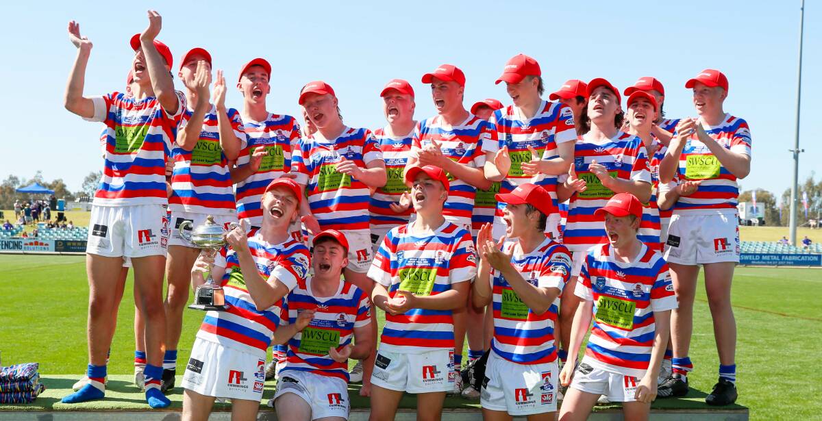 Young celebrates their Sullivan Cup grand final success last month.
