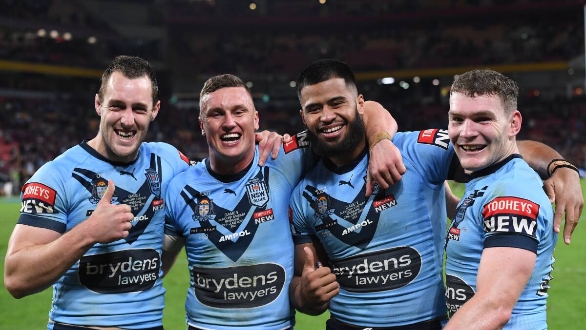 SWEET SUCCESS: Temora junior Liam Martin (right) celebrates NSW's series win with Blues teammates Isaah Yeo, Jack Wighton and Payne Haas on Sunday night. Picture: Getty Images