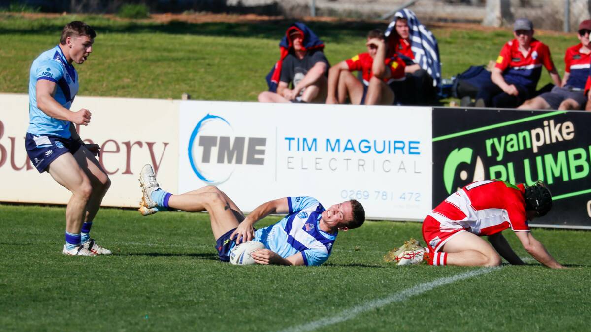 Malik Aitken goes over for the first of his two tries to help Tumut win through to the grand final. Picture by Les Smith