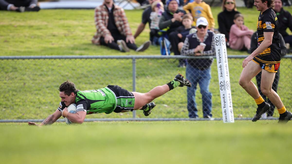 IN FULL FLIGHT: Lachlan Curtain Marlowe dives over for Albury's first try in their draw with Gundagai at Greenfield Park on Sunday. The Thunder still haven't lost to the Tigers since 2017. Picture: James Wilsthire